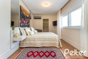 Casa em Condomínio à venda com 587m², 4 dormitórios, 4 suítes, 6 vagas, no bairro Terra Ville em PORTO ALEGRE