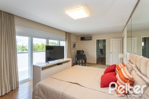 Casa em Condomínio à venda com 587m², 4 dormitórios, 4 suítes, 6 vagas, no bairro Terra Ville em PORTO ALEGRE