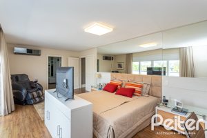 Casa em Condomínio à venda com 587m², 4 dormitórios, 4 suítes, 6 vagas, no bairro Terra Ville em PORTO ALEGRE