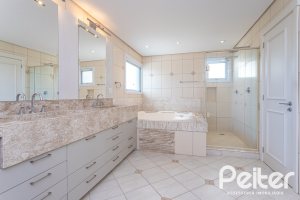 Casa em Condomínio à venda com 587m², 4 dormitórios, 4 suítes, 6 vagas, no bairro Terra Ville em PORTO ALEGRE