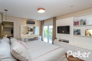 Casa em Condomínio à venda com 587m², 4 dormitórios, 4 suítes, 6 vagas, no bairro Terra Ville em PORTO ALEGRE