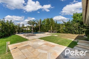 Casa em Condomínio à venda com 587m², 4 dormitórios, 4 suítes, 6 vagas, no bairro Terra Ville em PORTO ALEGRE