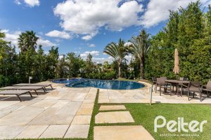 Casa em Condomínio à venda com 587m², 4 dormitórios, 4 suítes, 6 vagas, no bairro Terra Ville em PORTO ALEGRE