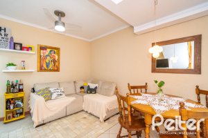 Casa em Condomínio à venda com 102m², 2 dormitórios, 1 suíte, 1 vaga, no bairro Guarujá em Porto Alegre