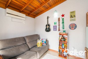 Casa em Condomínio à venda com 102m², 2 dormitórios, 1 suíte, 1 vaga, no bairro Guarujá em Porto Alegre