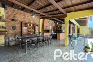 Casa à venda com 225m², 3 dormitórios, 1 suíte, 2 vagas, no bairro Ipanema em Porto Alegre