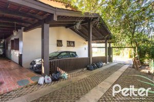 Casa à venda com 374m², 4 dormitórios, 1 suíte, 6 vagas, no bairro Jardim Isabel em Porto Alegre