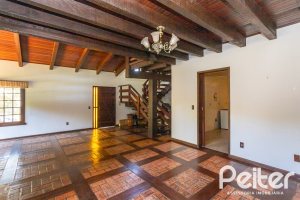 Casa à venda com 374m², 4 dormitórios, 1 suíte, 6 vagas, no bairro Jardim Isabel em Porto Alegre