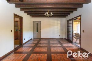 Casa à venda com 374m², 4 dormitórios, 1 suíte, 6 vagas, no bairro Jardim Isabel em Porto Alegre