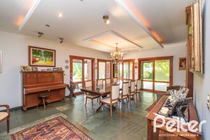 Casa em Condomínio à venda com 388m², 3 dormitórios, 2 suítes, 6 vagas, no bairro Cavalhada em PORTO ALEGRE