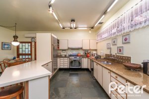 Casa em Condomínio à venda com 388m², 3 dormitórios, 2 suítes, 6 vagas, no bairro Cavalhada em PORTO ALEGRE