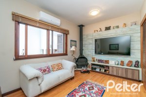 Casa em Condomínio à venda com 388m², 3 dormitórios, 2 suítes, 6 vagas, no bairro Cavalhada em PORTO ALEGRE