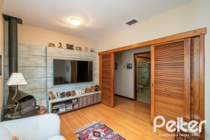 Casa em Condomínio à venda com 388m², 3 dormitórios, 2 suítes, 6 vagas, no bairro Cavalhada em PORTO ALEGRE