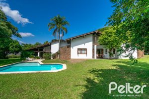 Casa em Condomínio à venda com 388m², 3 dormitórios, 2 suítes, 6 vagas, no bairro Cavalhada em PORTO ALEGRE