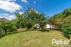 Casa em Condomínio à venda com 388m², 3 dormitórios, 2 suítes, 6 vagas, no bairro Cavalhada em PORTO ALEGRE