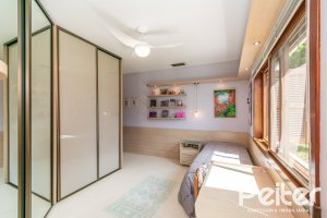 Casa em Condomínio à venda com 388m², 3 dormitórios, 2 suítes, 6 vagas, no bairro Cavalhada em PORTO ALEGRE