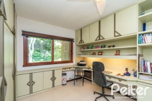 Casa em Condomínio à venda com 388m², 3 dormitórios, 2 suítes, 6 vagas, no bairro Cavalhada em PORTO ALEGRE