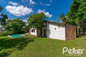 Casa em Condomínio à venda com 388m², 3 dormitórios, 2 suítes, 6 vagas, no bairro Cavalhada em PORTO ALEGRE