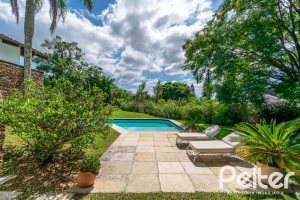 Casa em Condomínio à venda com 388m², 3 dormitórios, 2 suítes, 6 vagas, no bairro Cavalhada em PORTO ALEGRE