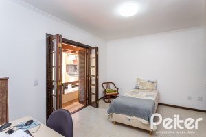 Casa à venda com 272m², 4 dormitórios, 2 suítes, 4 vagas, no bairro Ipanema em Porto Alegre
