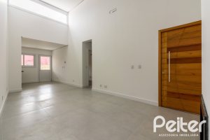 Casa em Condomínio à venda com 108m², 3 dormitórios, 2 suítes, 2 vagas, no bairro Hípica em PORTO ALEGRE