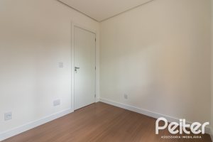 Casa em Condomínio à venda com 108m², 3 dormitórios, 2 suítes, 2 vagas, no bairro Hípica em PORTO ALEGRE