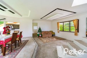 Casa em Condomínio à venda com 390m², 4 dormitórios, 3 suítes, 9 vagas, no bairro Nonoai em Porto Alegre