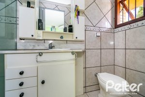 Casa em Condomínio à venda com 390m², 4 dormitórios, 3 suítes, 9 vagas, no bairro Nonoai em Porto Alegre