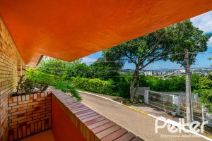 Casa em Condomínio à venda com 390m², 4 dormitórios, 3 suítes, 9 vagas, no bairro Nonoai em Porto Alegre