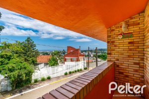 Casa em Condomínio à venda com 390m², 4 dormitórios, 3 suítes, 9 vagas, no bairro Nonoai em Porto Alegre