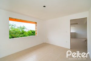 Casa em Condomínio à venda com 390m², 4 dormitórios, 3 suítes, 9 vagas, no bairro Nonoai em Porto Alegre