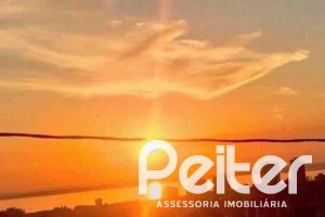 Casa em Condomínio à venda com 390m², 4 dormitórios, 3 suítes, 9 vagas, no bairro Nonoai em Porto Alegre