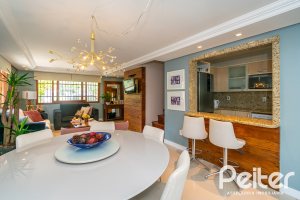 Casa em Condomínio à venda com 194m², 3 dormitórios, 1 suíte, 3 vagas, no bairro Tristeza em Porto Alegre