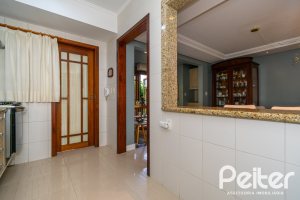 Casa em Condomínio à venda com 194m², 3 dormitórios, 1 suíte, 3 vagas, no bairro Tristeza em Porto Alegre