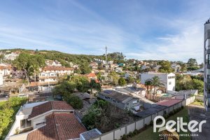 Apartamento à venda com 109m², 3 dormitórios, 1 suíte, 2 vagas, no bairro Tristeza em PORTO ALEGRE