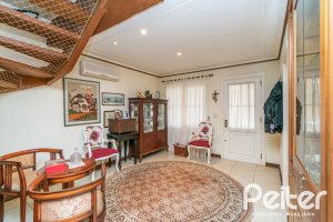 Casa em Condomínio à venda com 229m², 4 dormitórios, 1 suíte, 4 vagas, no bairro Terra Ville em PORTO ALEGRE