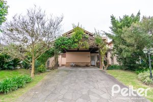 Casa em Condomínio à venda com 229m², 4 dormitórios, 1 suíte, 4 vagas, no bairro Terra Ville em PORTO ALEGRE