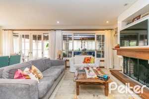 Casa em Condomínio à venda com 229m², 4 dormitórios, 1 suíte, 4 vagas, no bairro Terra Ville em PORTO ALEGRE