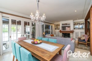 Casa em Condomínio à venda com 229m², 4 dormitórios, 1 suíte, 4 vagas, no bairro Terra Ville em PORTO ALEGRE