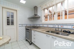 Casa em Condomínio à venda com 229m², 4 dormitórios, 1 suíte, 4 vagas, no bairro Terra Ville em PORTO ALEGRE