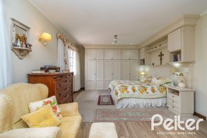 Casa em Condomínio à venda com 229m², 4 dormitórios, 1 suíte, 4 vagas, no bairro Terra Ville em PORTO ALEGRE