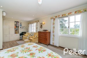 Casa em Condomínio à venda com 229m², 4 dormitórios, 1 suíte, 4 vagas, no bairro Terra Ville em PORTO ALEGRE