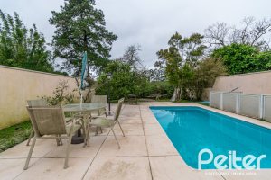 Casa em Condomínio à venda com 229m², 4 dormitórios, 1 suíte, 4 vagas, no bairro Terra Ville em PORTO ALEGRE