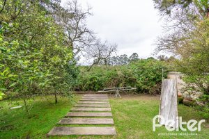 Casa em Condomínio à venda com 229m², 4 dormitórios, 1 suíte, 4 vagas, no bairro Terra Ville em PORTO ALEGRE