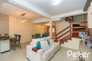 Casa em Condomínio à venda com 133m², 3 dormitórios, 1 suíte, 2 vagas, no bairro Tristeza em Porto Alegre