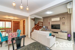 Casa em Condomínio à venda com 133m², 3 dormitórios, 1 suíte, 2 vagas, no bairro Tristeza em Porto Alegre