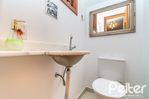 Casa em Condomínio à venda com 133m², 3 dormitórios, 1 suíte, 2 vagas, no bairro Tristeza em Porto Alegre