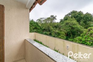 Casa em Condomínio à venda com 133m², 3 dormitórios, 1 suíte, 2 vagas, no bairro Tristeza em Porto Alegre
