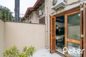 Casa em Condomínio à venda com 133m², 3 dormitórios, 1 suíte, 2 vagas, no bairro Tristeza em Porto Alegre