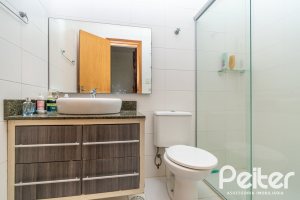 Casa em Condomínio à venda com 133m², 3 dormitórios, 1 suíte, 2 vagas, no bairro Tristeza em Porto Alegre